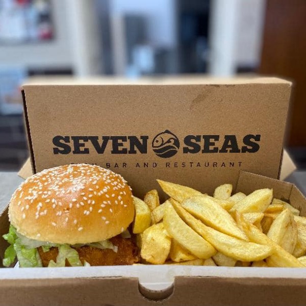 Burger and chips in a takeaway box